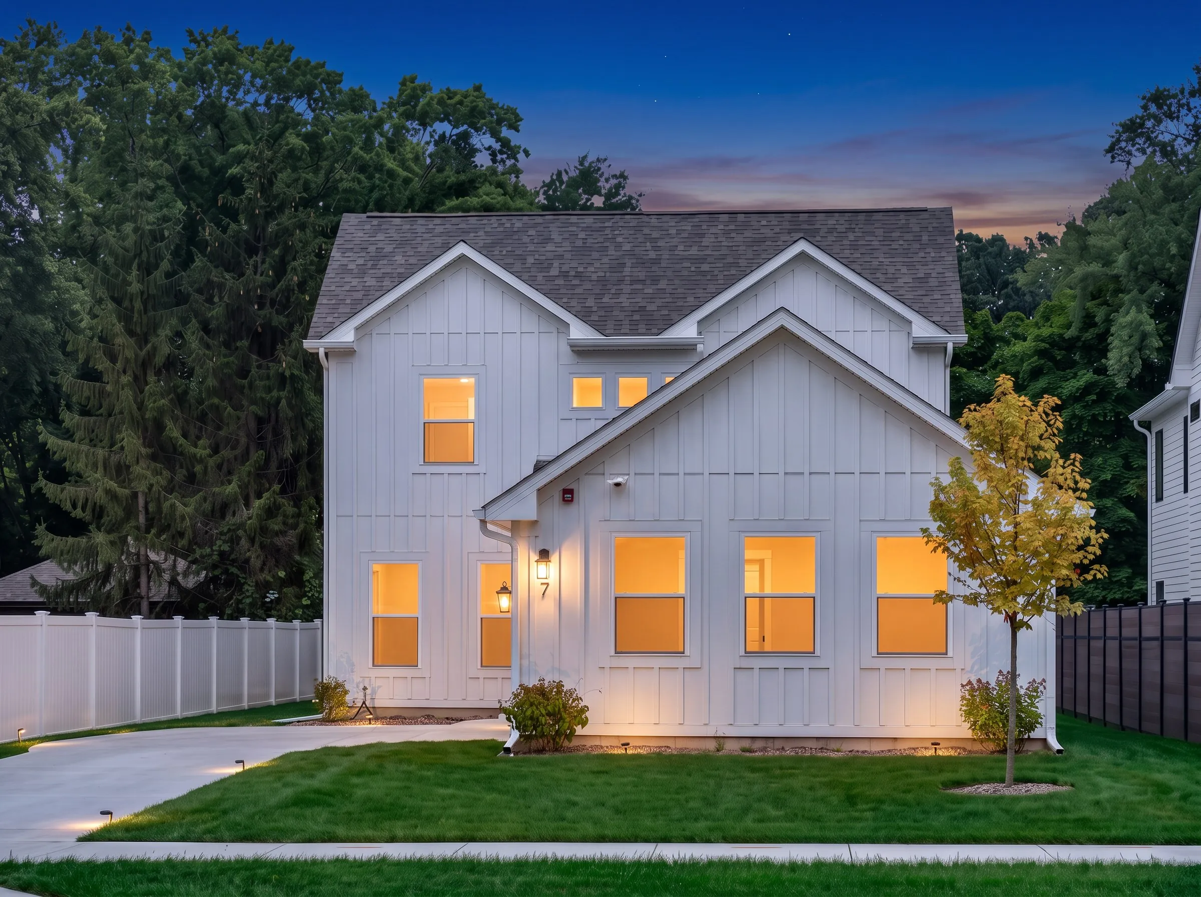 Twilight exterior conversion of a board-and-batten farmhouse shot by Ian K Captures